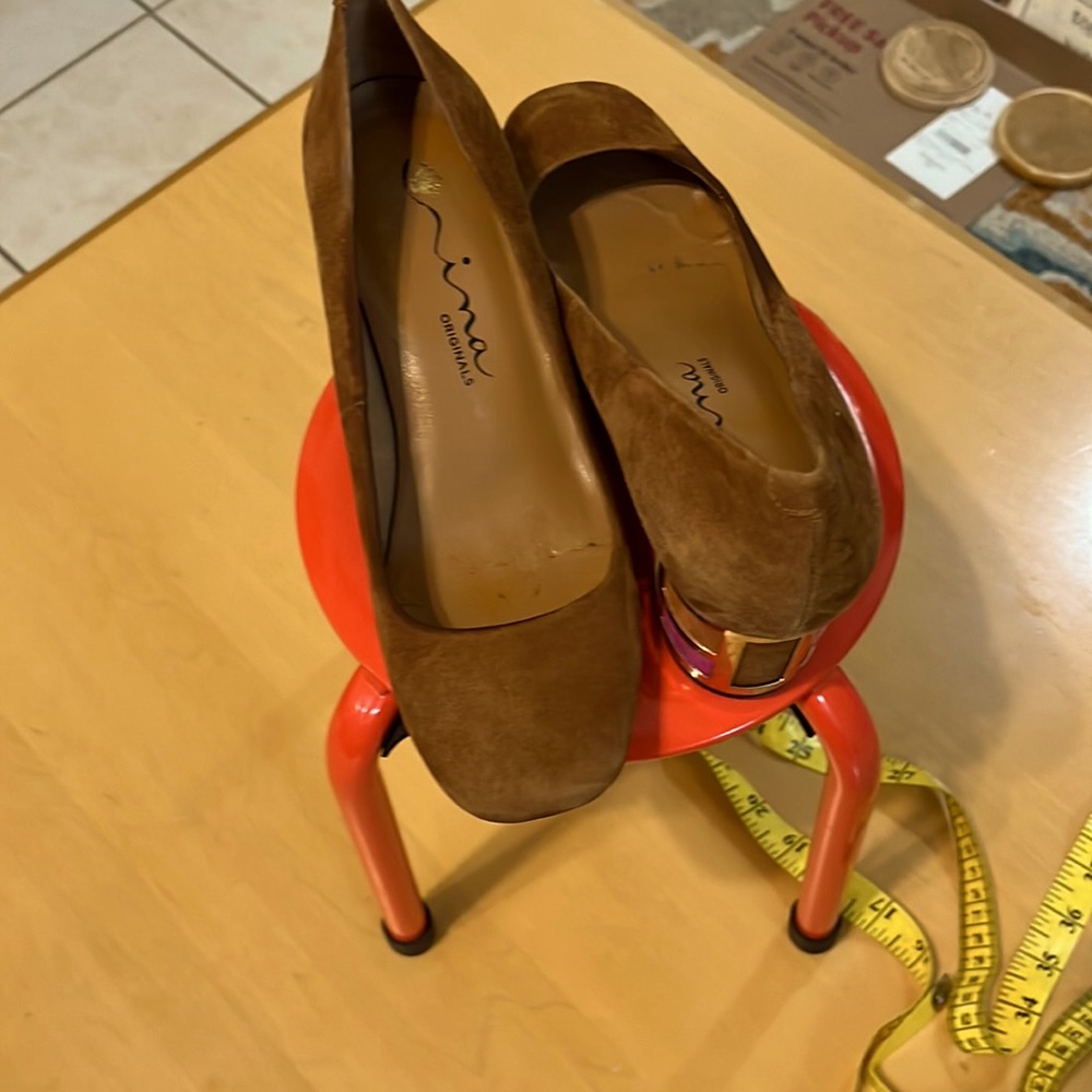 Beautiful suede shoes with a detailed heel.